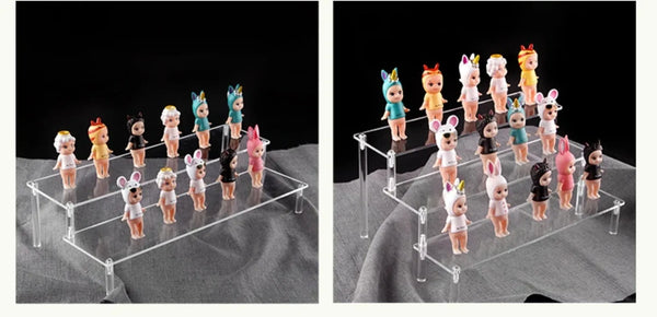 Lipstick collection displayed on transparent acrylic tiered holder