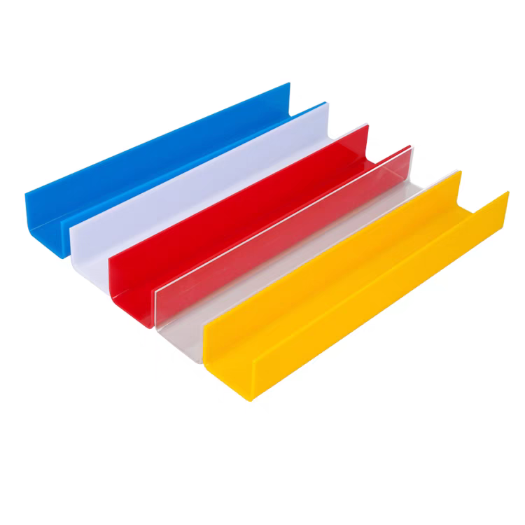 Colorful polished plastic U-channels in blue red and yellow showing professional surface finishing quality