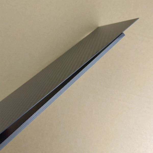 Custom CNC-cut carbon fiber sheet with matte and glossy surface