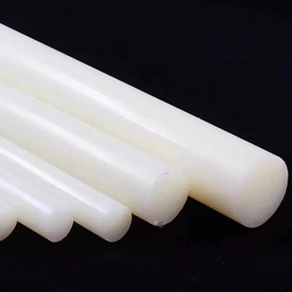 Custom machined nylon gear made from white plastic rod