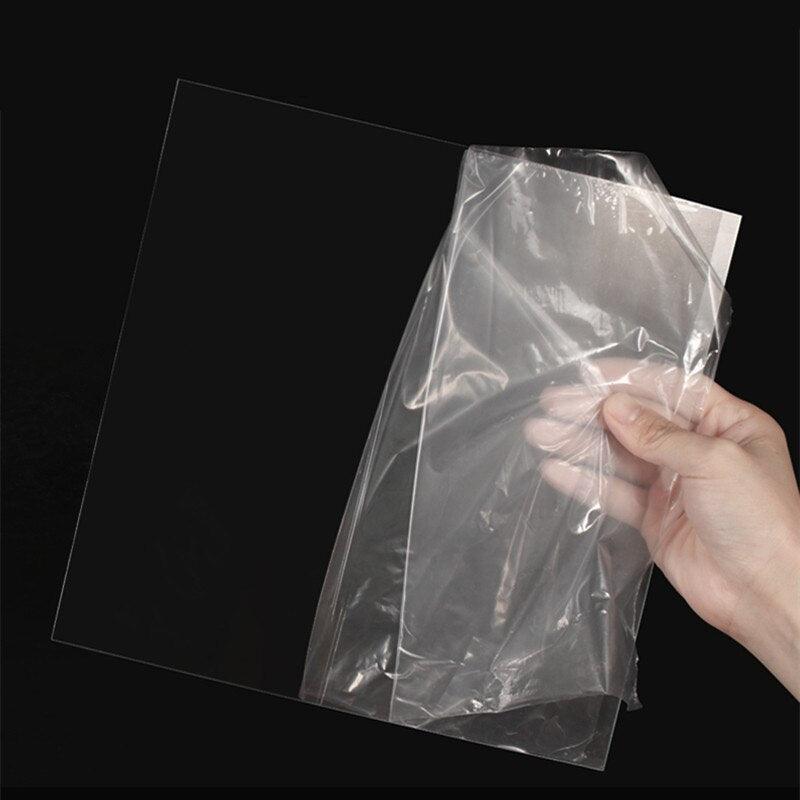 cutting-clear-pvc-with-scissors