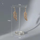 Acrylic earring holder with hoop earrings displayed