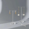 Transparent earring rack with rectangular bottom, side angle