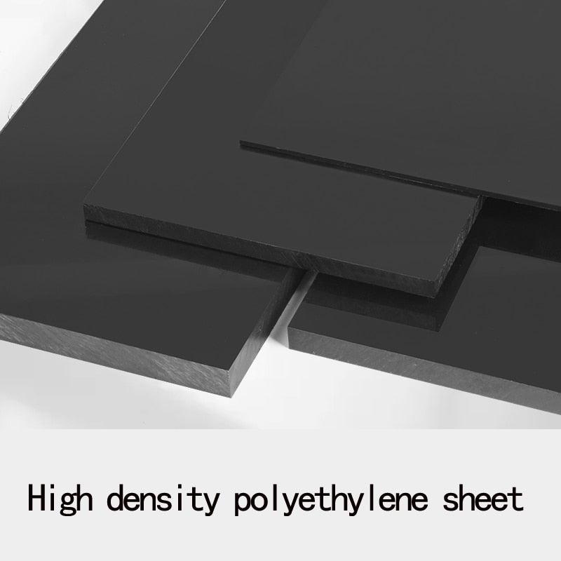 Stacked HDPE cutting boards in different colors and sizes