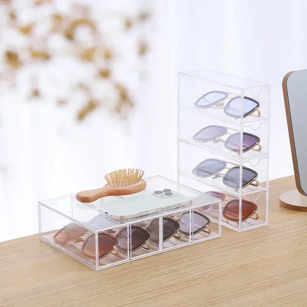 Home vanity setup with acrylic sunglasses organizer on dresser
