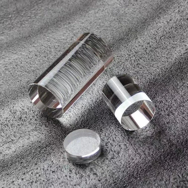 Luxury earrings showcased on transparent acrylic display riser