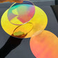 Laser plexiglass rainbow sheet under natural light creating shimmering rainbow colors