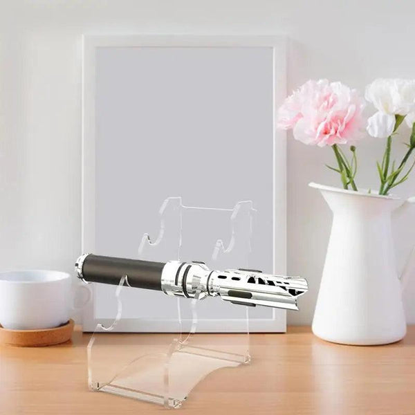 Force FX lightsaber displayed on acrylic stand
