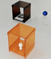 Orange acrylic side table with waterfall edge design