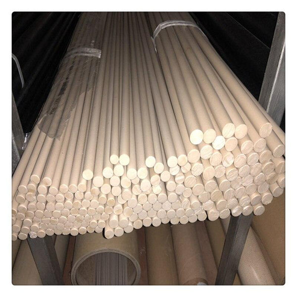 PEEK rod being CNC machined