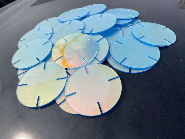 Personalized gift featuring custom engraved iridescent acrylic disc illuminated lamp