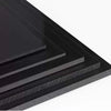 Smooth black polypropylene board surface finish close up detail view