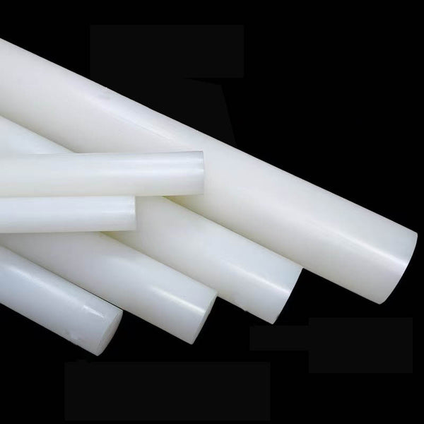 Close-up surface texture of high-performance PVDF plastic rod