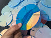 Rainbow PMMA acrylic disc showing color change effect from different viewing angles
