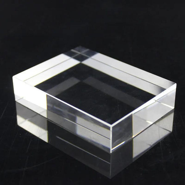 Ring placed on transparent acrylic block for photography