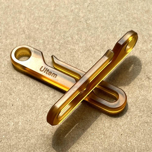 Close-up view of Ultem PEI EDC keychain with amber finish