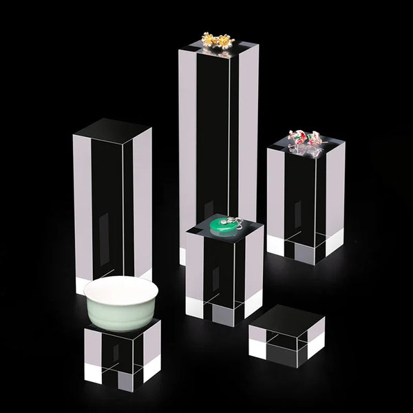 Luxury watch showcased on premium acrylic cube display stand